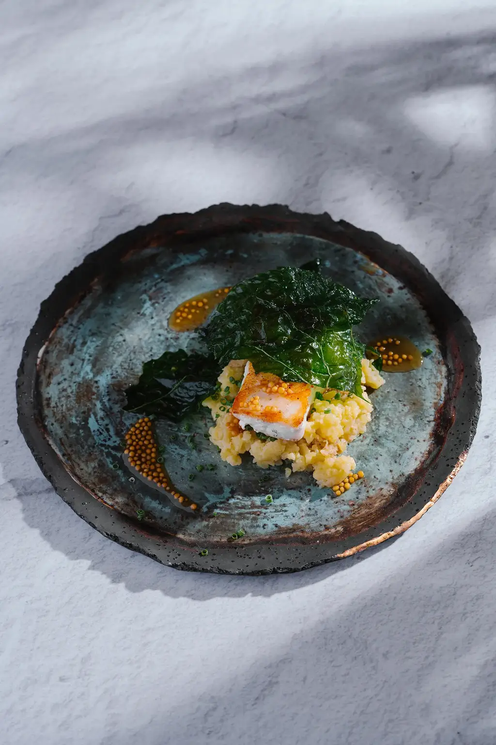 Colorful gourmet plate at Evolution by Pikaia