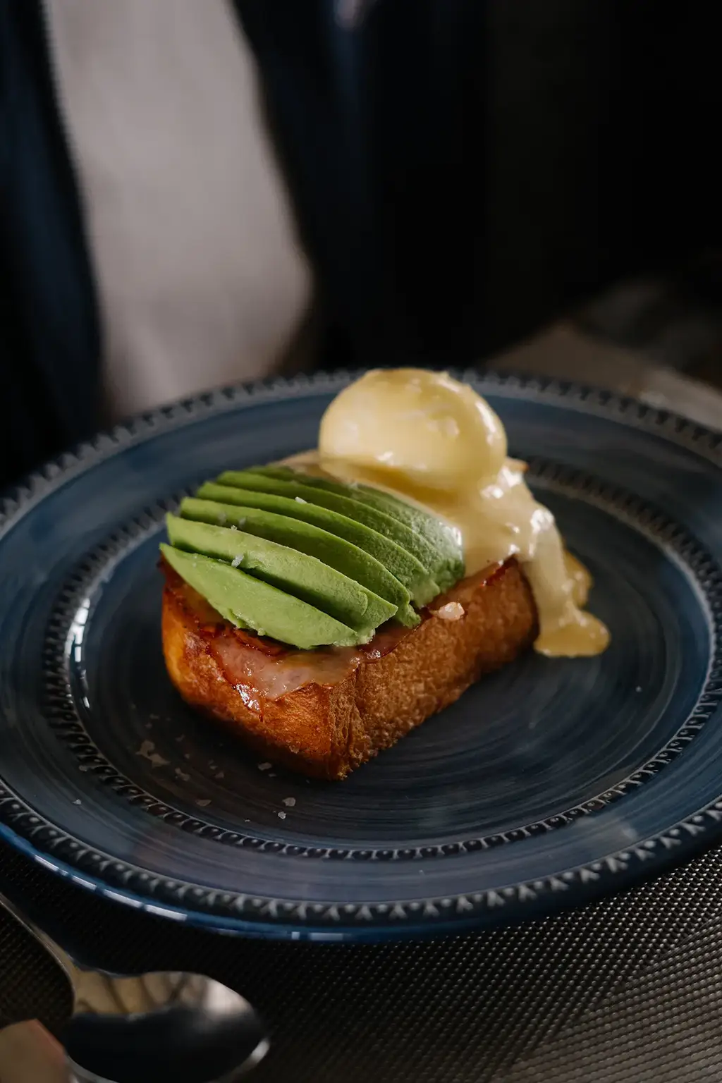 Poached eggs with avocado on toast