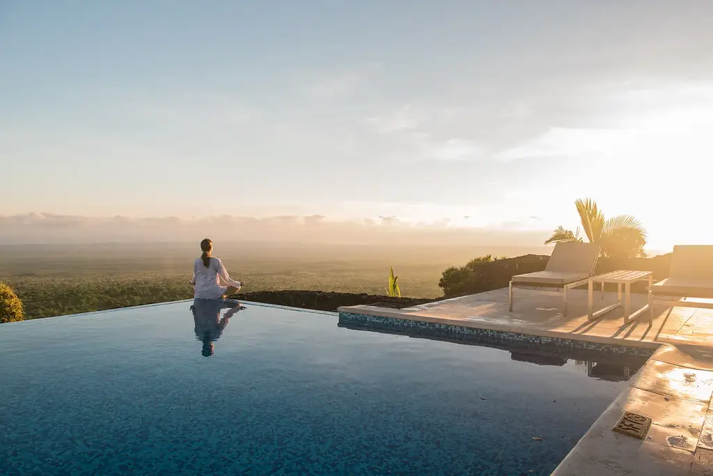 Infinity pool overlooking the Pacific at sunset