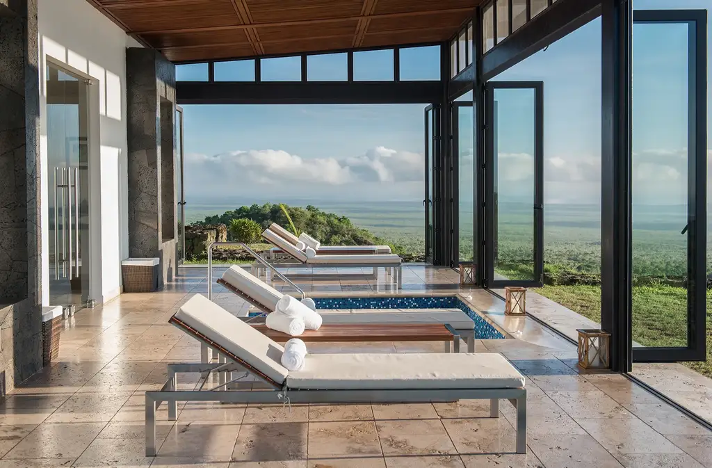 Spa lounge with plunge pool and open views of Santa Cruz